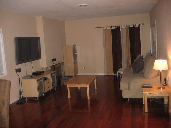 ELEGANT Living Area w/Cherry Hardwood Floors; NEW Paint throughout Home