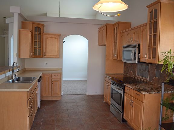 Large open kitchen design with access to dining room and living room