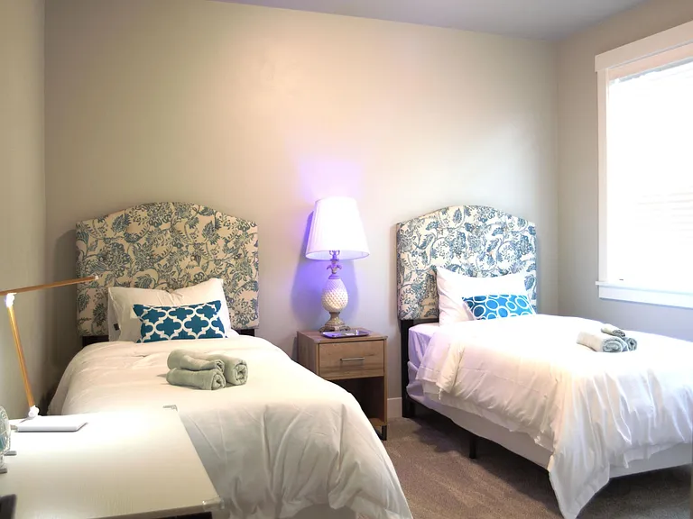 3rd Bedroom - 2 Twin Beds
* Large closet 
* Desk & Chairs
* Colors change table lamp