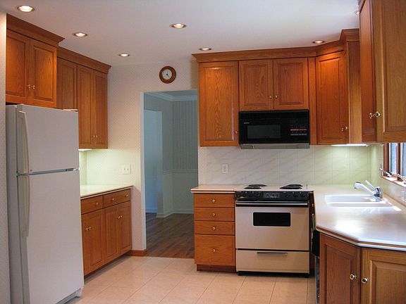 custom cabinets and recessed lighting