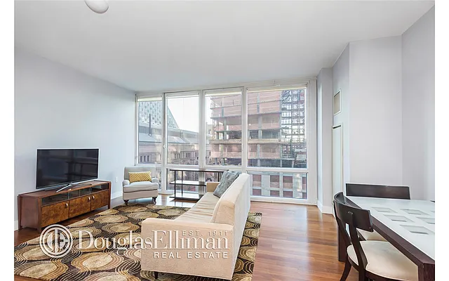 Sold by Douglas Elliman | media 12