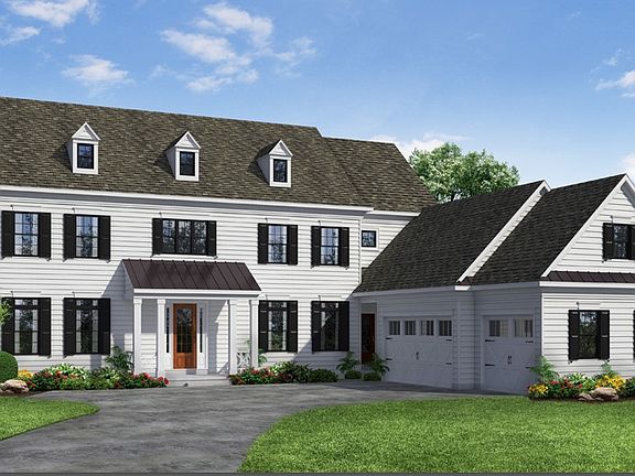 Front elevation of a Stone home from Garman Builders