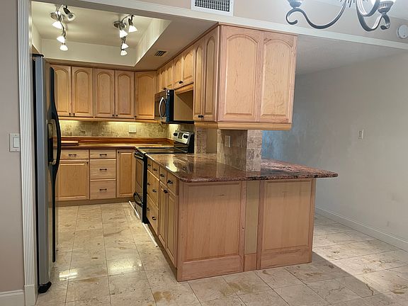 View into kitchen and dining area