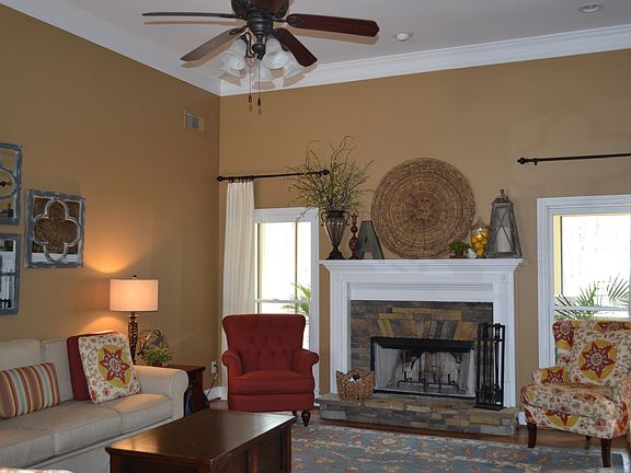 Living room w/rock fireplace