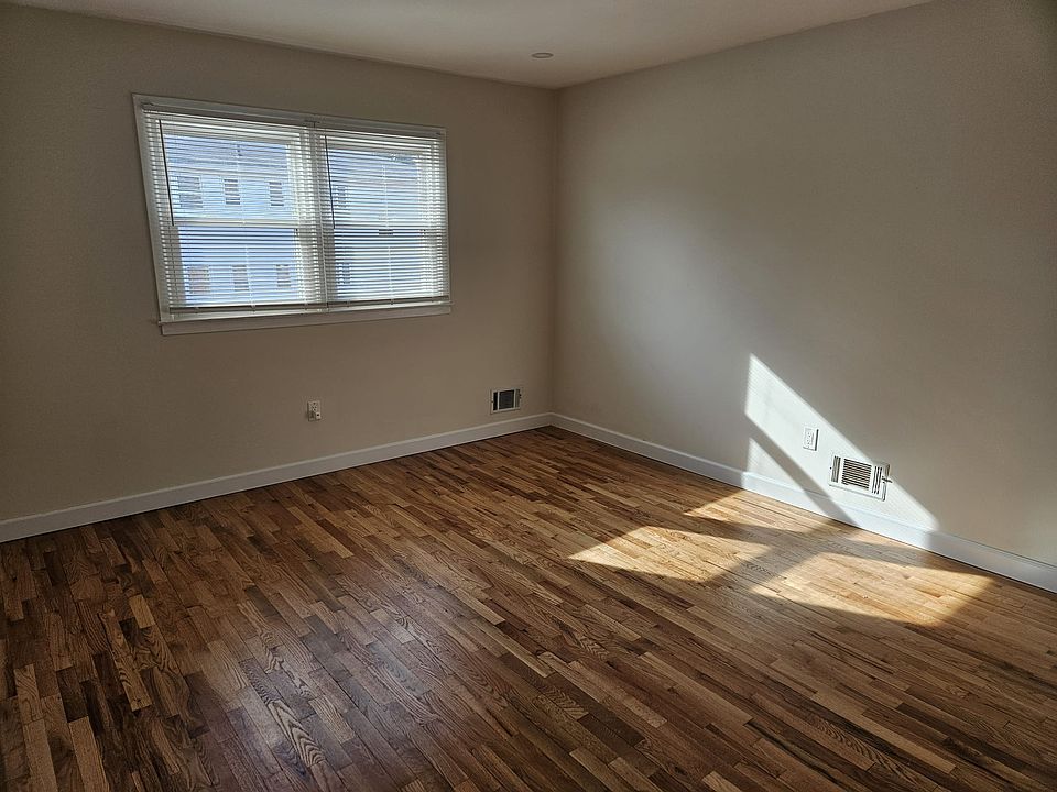 Large master bedroom with attached bathroom and walk-in closet
