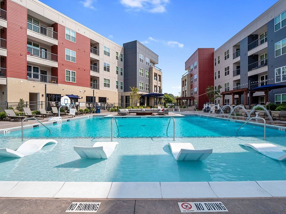 Resort-style pool and sun shelf with lounges