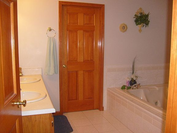 master bath with a whirlpool tub built for two