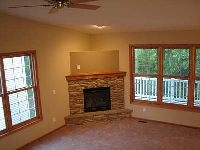 12' Vaulted ceiling and ceiling fan.