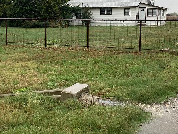Fenced front of property