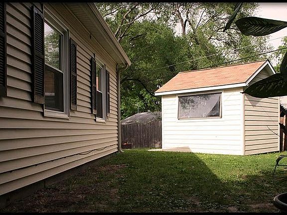 Workshop/storage shed in backyard
