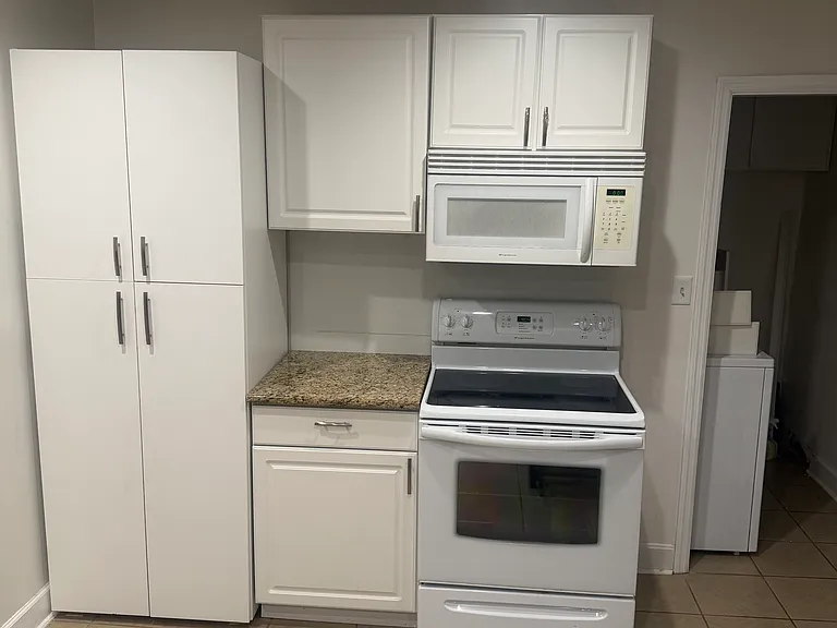 Pantry, stove and laundry room