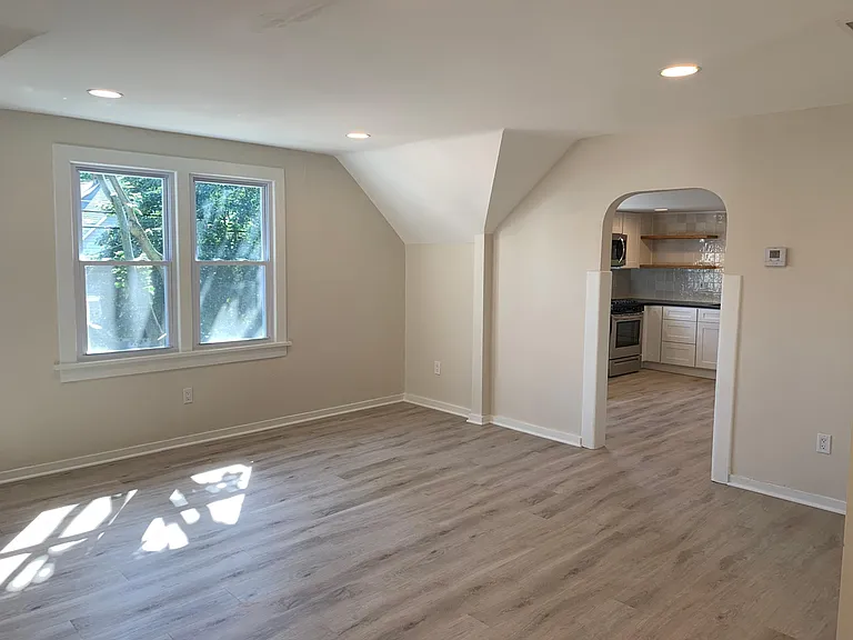 Living room looking into kitchen