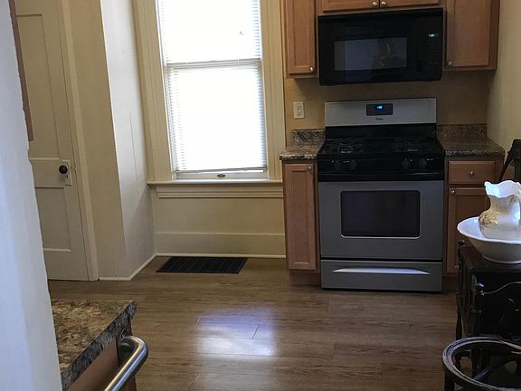 View of kitchen from bathroom