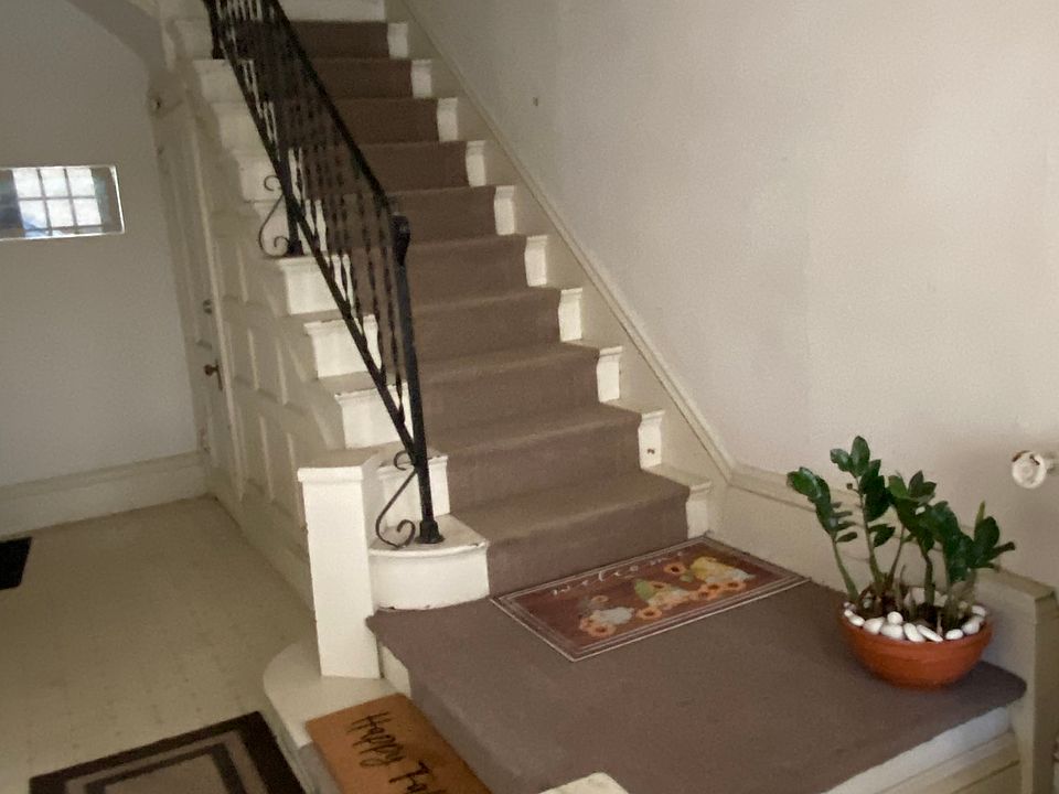 Inside hall. 2 bedroom apartment is up the stairs