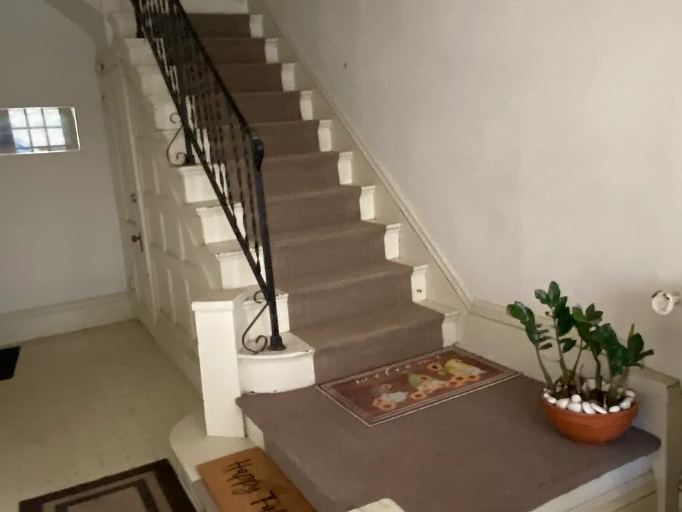 Inside hall. 2 bedroom apartment is up the stairs