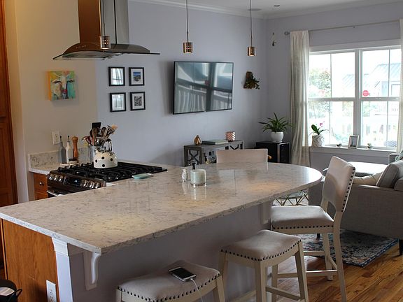 Newly remodeled kitchen with granite countertops and stainless steel appliances