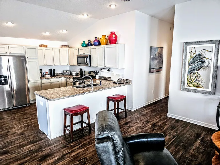 Open floor plan from the kitchen to the dining room and into the living room.