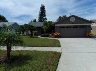 2440 Blossom Lake Dr, Holiday, FL 34691