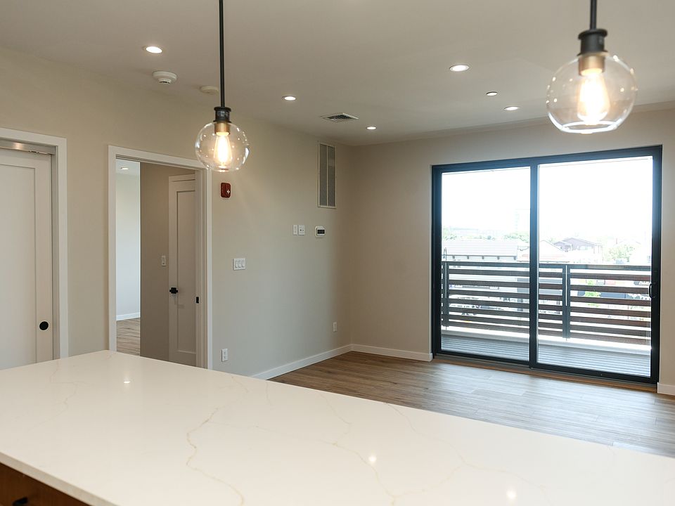 Kitchen, coat closet, living room, bedroom entrance