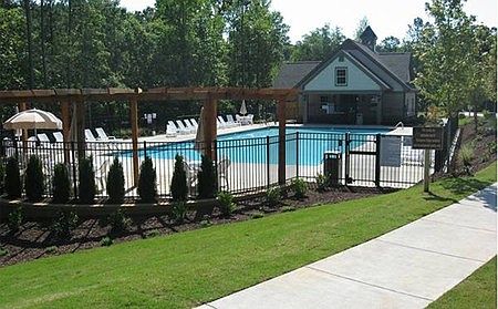 The pool and the gym are close to the townhome.