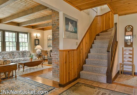 Living room and staircase to second floor