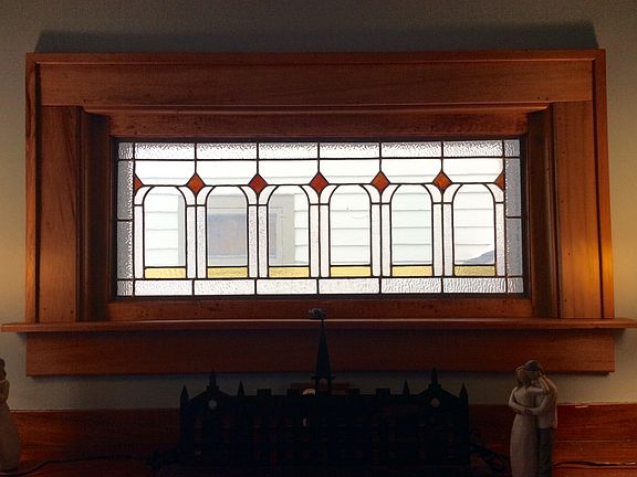 Stained glass over fireplace