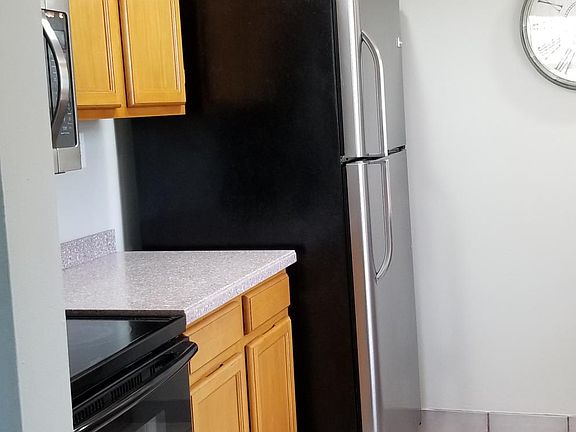 Kitchen stove and refrigerator