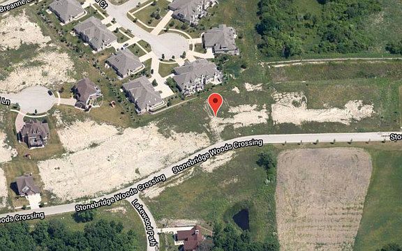 3rd image of 13816 W Stonebridge Woods Xing