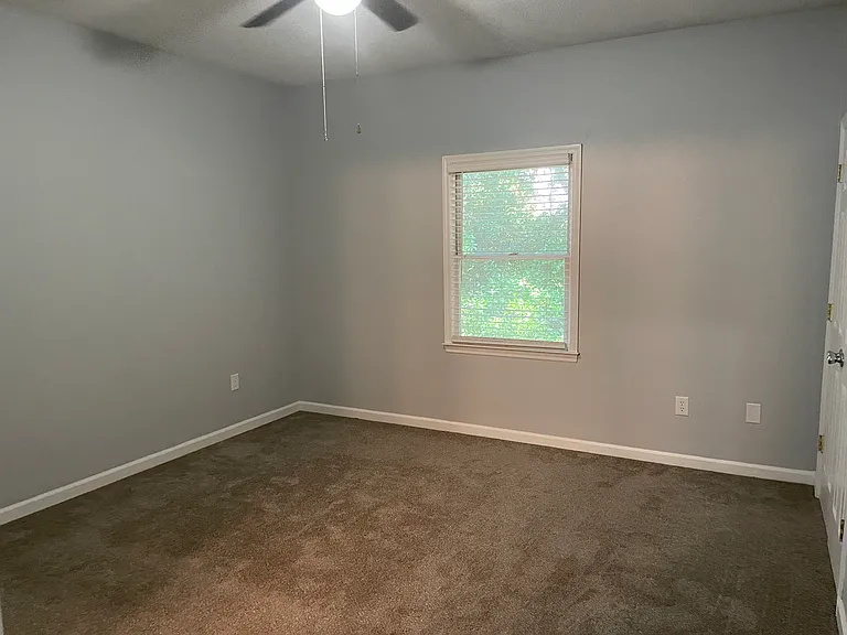 The rear bedroom is large enough for a king-sized bed.