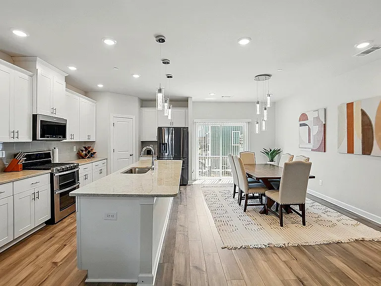 Modern kitchen with island & granite countertops