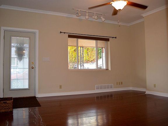 Living area looking towards front entry.
