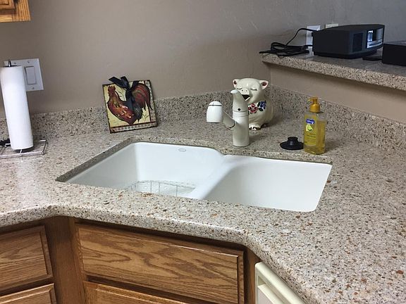 Kitchen sink with view out the windows.