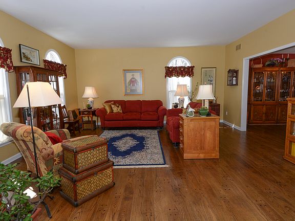 Gorgeous Formal Living Room with Gleaming Hardwood Floors