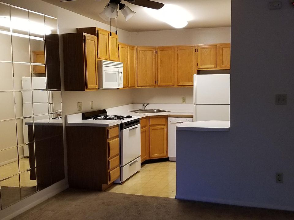 Full sized kitchen with microwave and dishwasher