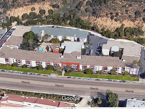 Overhead View of Franciscan. Unit 105 is behind the Jacuzzi. Unit 105 does not hear any traffic noise. Residents' vehicles enter the parking lot through an electronic gate on the left (North) end of the building. Traffic flow is one way and exits through