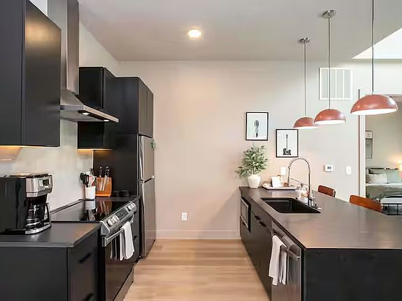 Full kitchen - smart oven/stove, built in microwave, dishwasher, refrigerator/freezer, plenty of storage