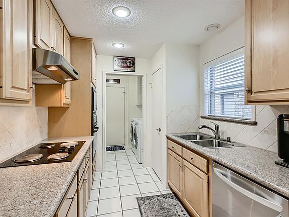 Galley Kitchen looking towards the Laundry Room