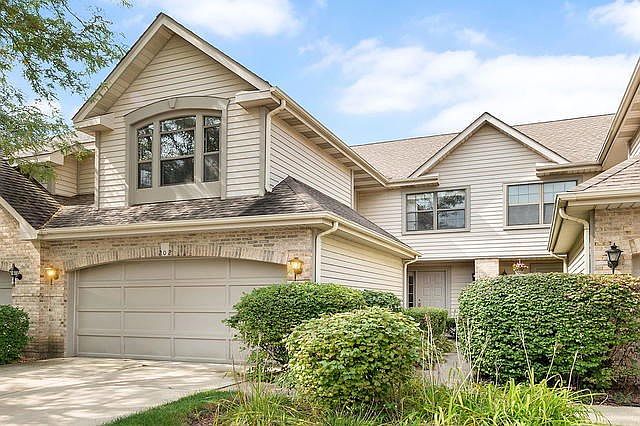 Landscaped Courtyard Entry. Classic Exterior is Maintenance Free Brick and Aluminum Siding. Bloomfield Club's Townhomes, Leisure and Luxury Homes are Built around a $Million+ Clubhouse.