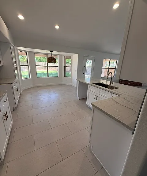 Newly remodeled kitchen with gorgeous quartz countertops