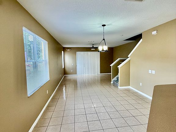 Walk in to an open floor plan with dining area flowing into great room.