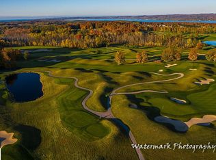 1 Fairway Ct, Kewadin, MI 49648