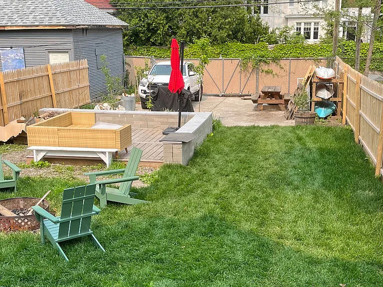 Fenced backyard with off street parking