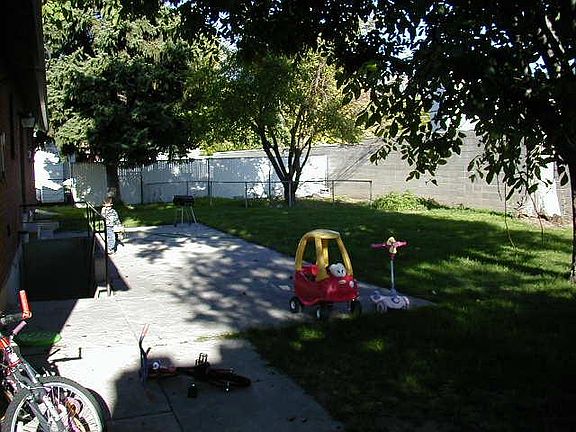 Back yard - Downstairs entrance shown on left