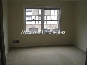 Bedroom with walk-in closet.