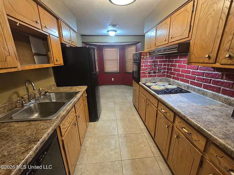 8209 Claiborne Dr — Photo 10
