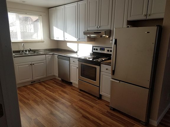 Kitchen with newer appliances. 