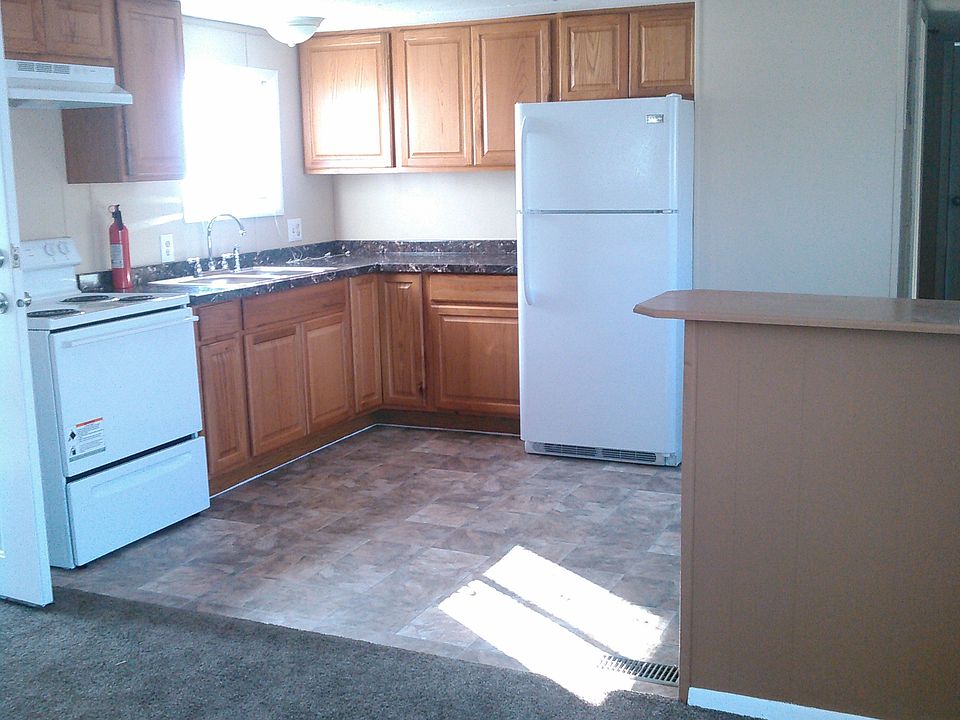 Kitchen and Dining Room with New Appliances and Lazy Susan