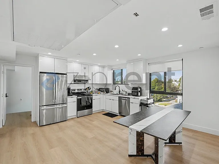 1438 W 37th Dr — Photo 8