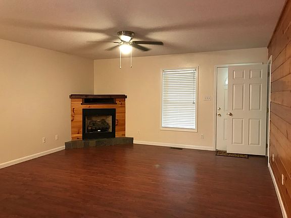 Alternate view of living area with propane fireplace. Tenant must obtain propane and tank service contract, if desired.