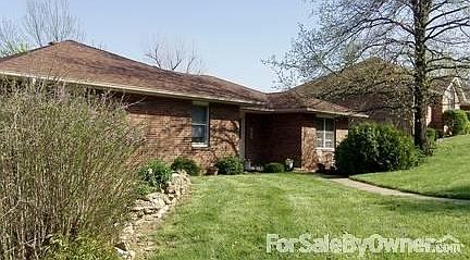 324 Willow Creek Dr.
						:
						Brick on three sides with steel siding in the rear. Roof is four years old.
